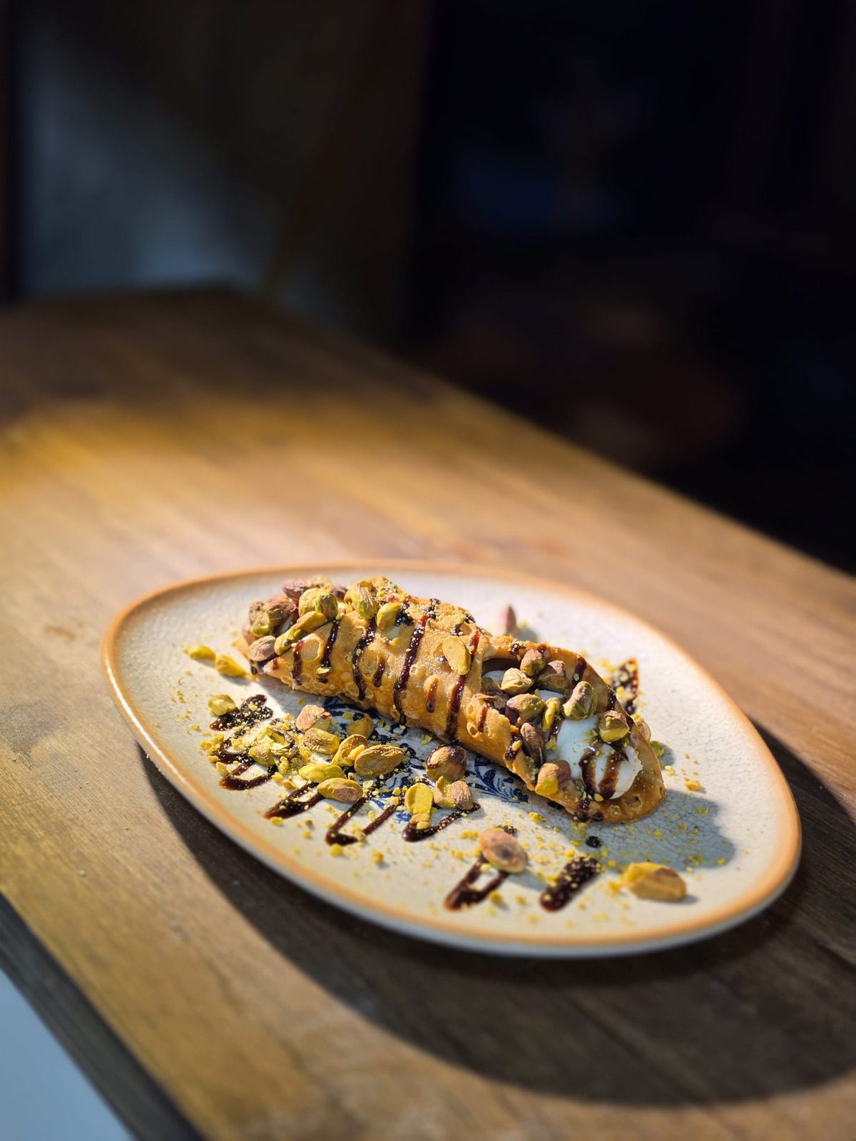 Pistachio dessert with chocolate drizzle
