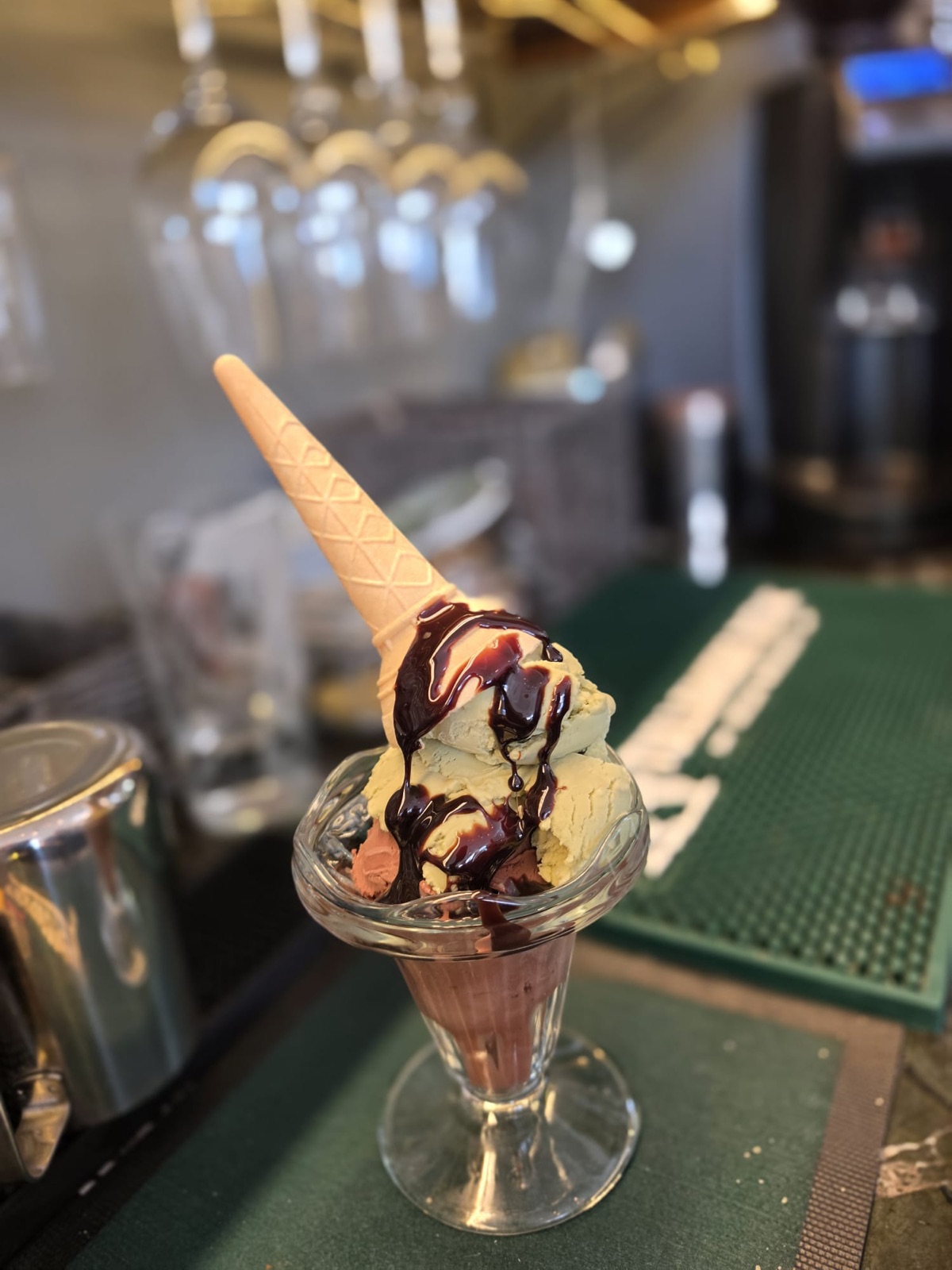 House-made gelato with chocolate sauce